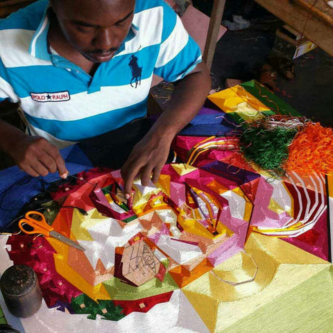 Yebs in the process of making Silk Thread Art.