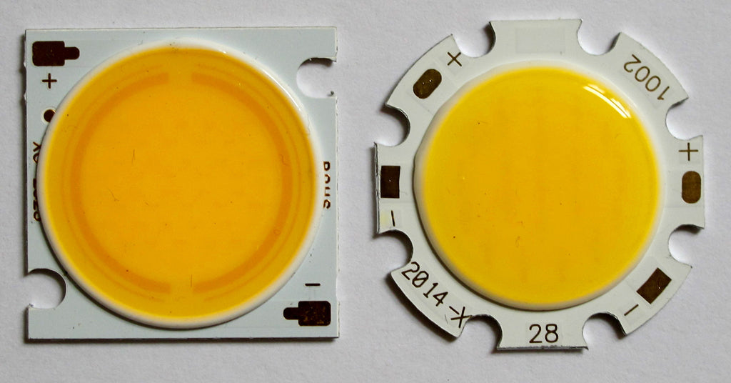 image of two chip on board or COBB LEDs super close up