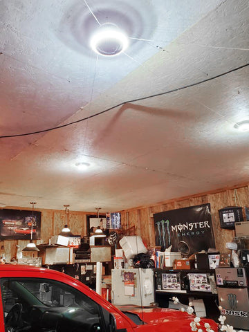 user garage with spectacular lighting mpi trilight motion deformable garage light