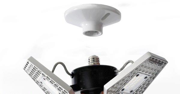 animated img of a TRiLIGHT deformable light bulb screwing into a standard E26 light socket.