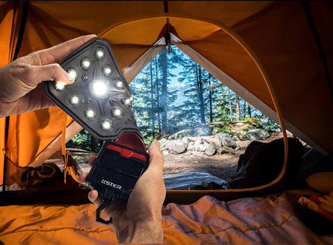 THE FLEXIT SOLAR BY STKR CONCEPTS LIGHITNG UP A TENT WHILE CAMPING