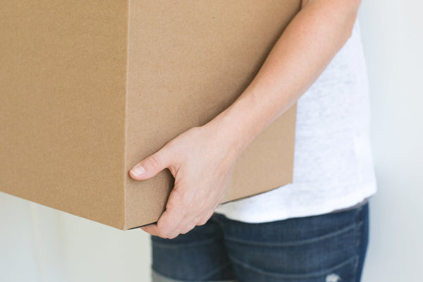 person holding a box