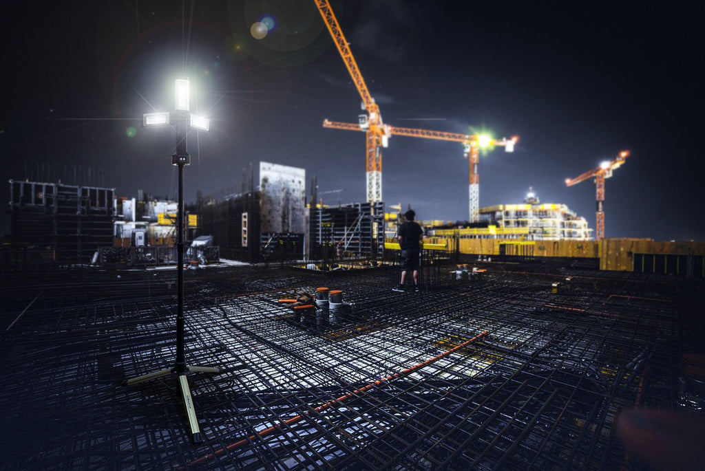 TRi-Mobile on a tripod sitting in an industrial construction setting at night