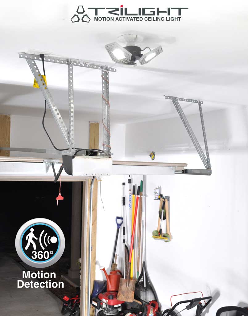 TRilight deformable light bulb installed on a garge ceiling near the garage door opener.