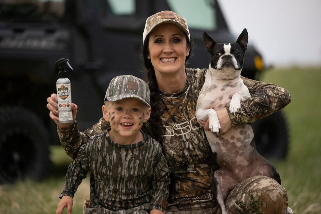 mom, son, and dog hunting with ranger ready repellents