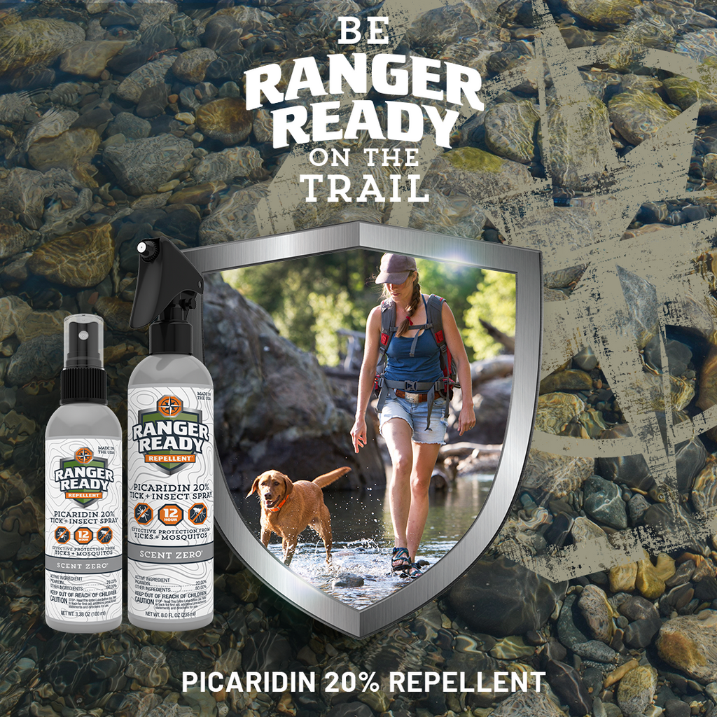 Ranger Ready Repellents Picaridin Icaridin woman and dog hiking through trail in shallow water with ranger ready repellents