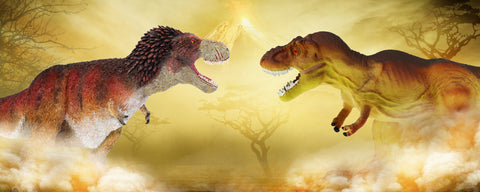 A Feathered T-Rex figurine facing off against a non-feathered T-Rex figurine