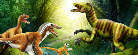 Velociraptor figurines from Safari Ltd in a wilderness setting.