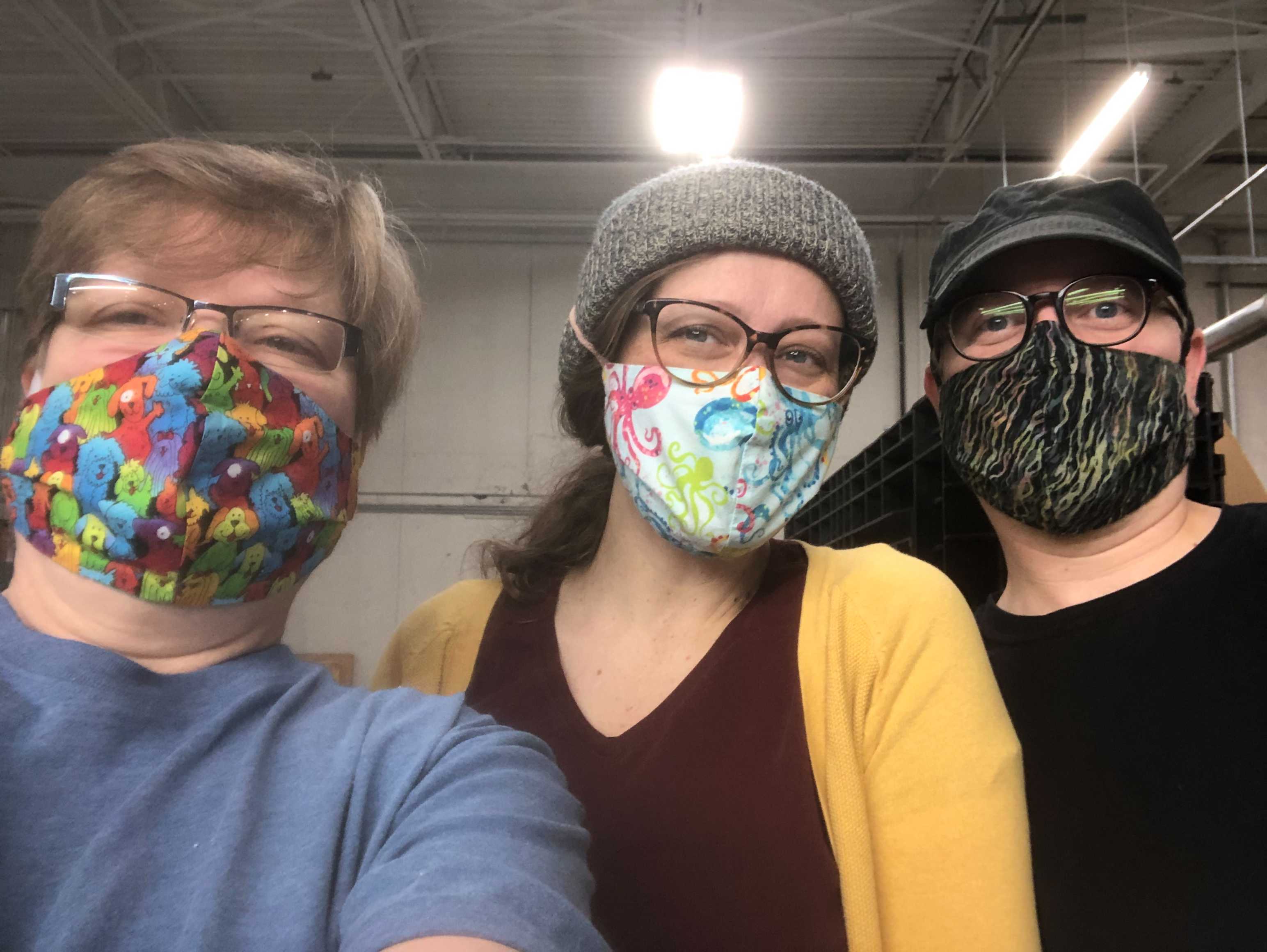 Talea with East Fork employees Lisa and Brock wearing masks