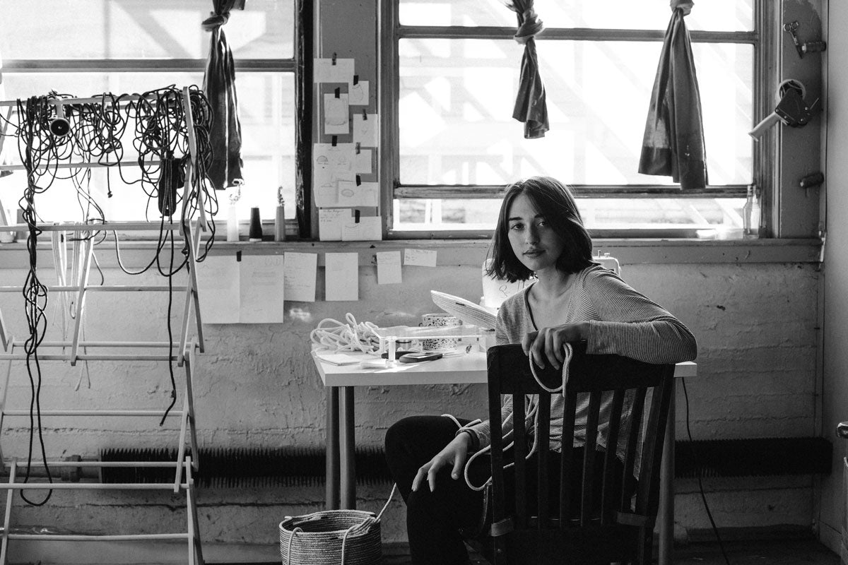 Lindsey at 18 in her first sewing studio