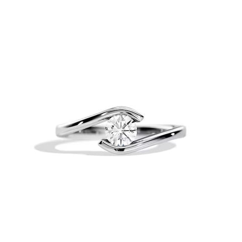 Tension setting engagement ring