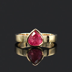 custom bezel engagement ring 18k yellow and ruby