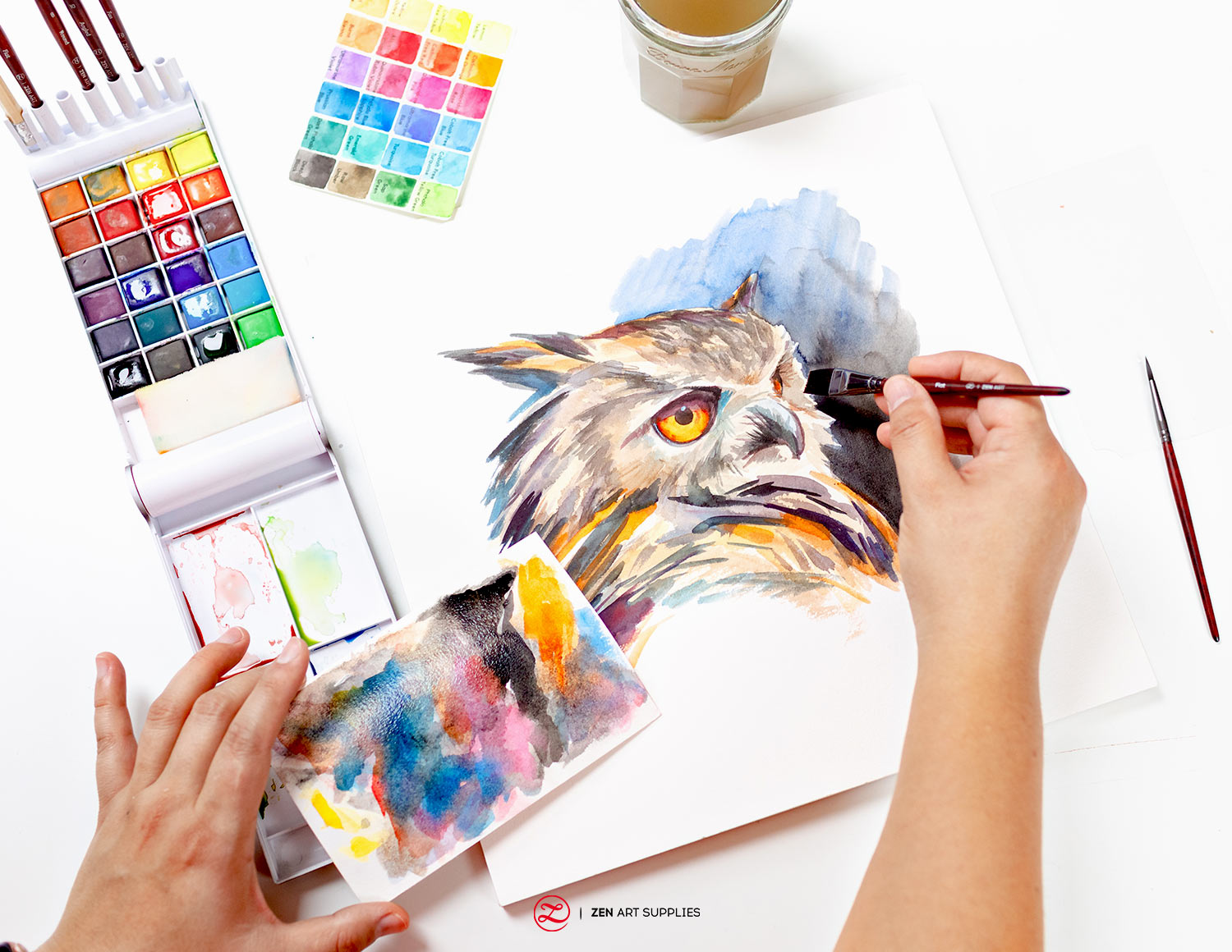 Eagle watercolor being painted on a watercolor block using a travel paint set.