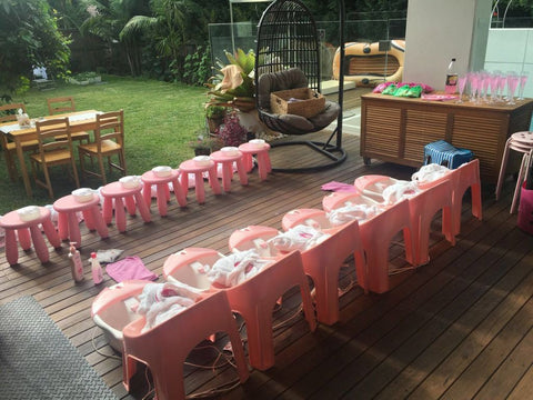 a party girl's pink and white pamper party set up 