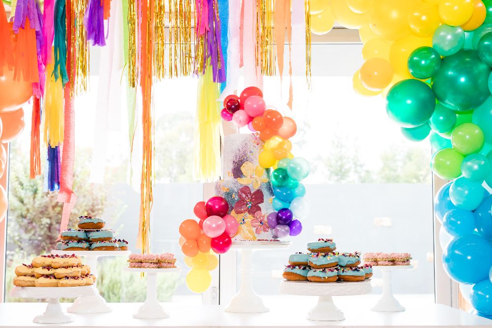 Rainbow Unicorn Cake with desserts