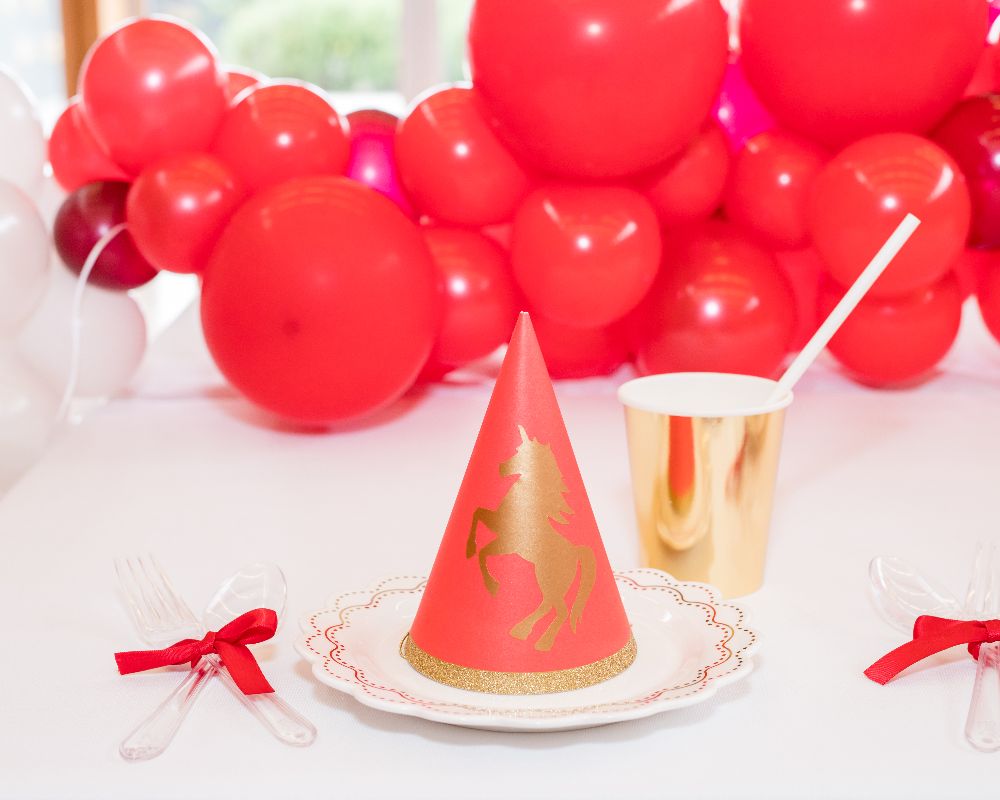 Kids Unicorn Party décor and party hat.<p style=