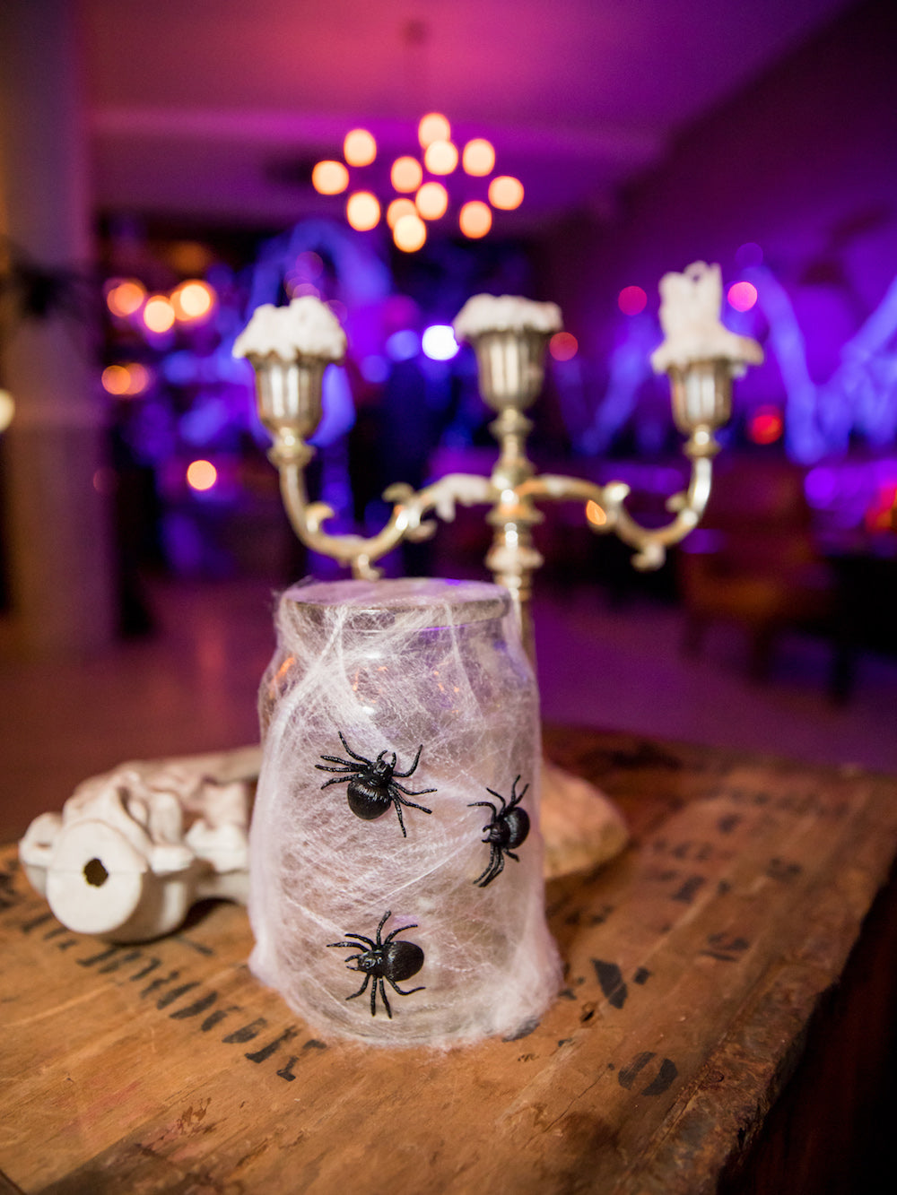 Halloween Decorations: Jar covered in spider web and spiders