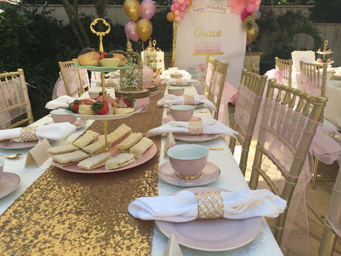 Pink and Gold Kids High Tea Party set up with Tiffany Chair Hire