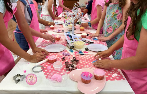 Kids having fun at a Cupcake Decorating Party in the North West