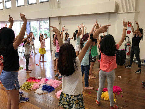 Kids Dancing at a Disco Party with a Disco Entertainer