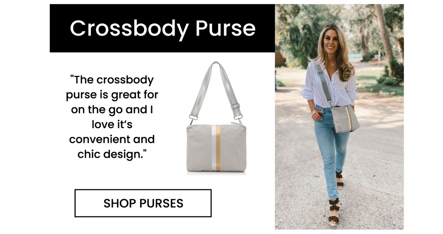 Woman in white button up and jeans wearing a light gray crossbody purse