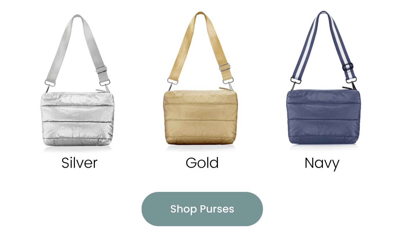 Three puffer crossbody purses in silver, gold, and shimmer navy