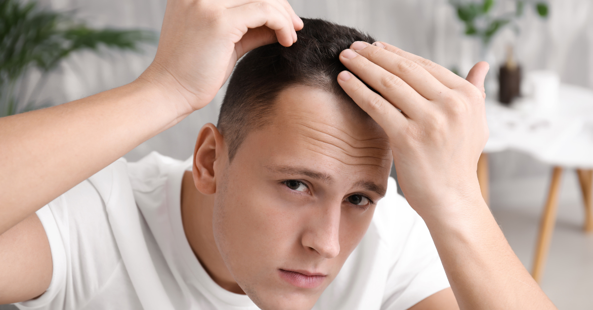 man developing a hair care routine for hair growth
