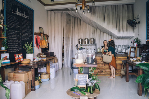 A woman shopping at a zero-waste store.