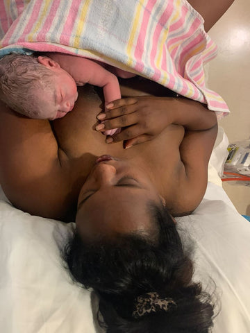mother holds baby in nsw hospital  after drug free labour
