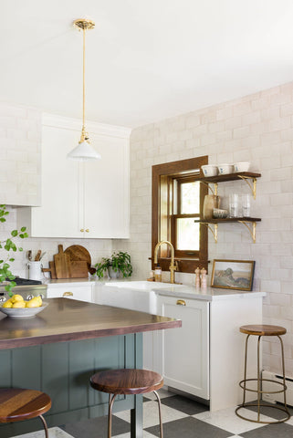 weathered white tiles add texture to kitchen walls. Blog post with 7 interior design tips taken from Netflix series Dream Home Makeover. Achieve this look with vintage-etc. We make custom made & bespoke tables, benches, free-standing kitchen islands, desks, media units & wardrobes in our Cape Town & Johannesburg workshops - using Oak, Oregon, Ash, Beech, Birch Ply & Meranti. We also sell imported furniture, provide design consulting services & make soft furnishing e.g. sofas & upholstered chairs in linen, velvet & stain resistant fabric  