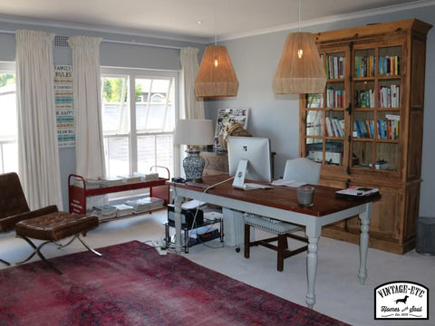 Home office with Manor bookcase and over dyed persian rug