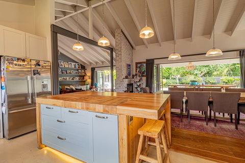 Bespoke Solid Oak free-standing kitchen island with baby blue drawers and cabinets, LED strip lights, an inset butchers block and solid Oak natural butt style barstools. Interior design blog about our tips on bringing your kitchen to life without spending too much money. Written by vintage-etc in Cape Town. We make custom made & bespoke tables, benches, free-standing kitchen islands, desks, media units & wardrobes in our Cape Town & Johannesburg workshops – using Oak, Oregon, Ash, Beech, Birch Ply & Meranti. We also sell imported furniture, provide design consulting services & make soft furnishings e.g. sofas & upholstered chairs in linen, velvet & stain resistant fabric.