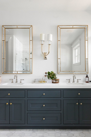 double bathroom vanity in an accent colour with stone tops, mirrors and good lighting. Blog post with 7 interior design tips taken from Netflix series Dream Home Makeover. Achieve this look with vintage-etc. We make custom made & bespoke tables, benches, free-standing kitchen islands, desks, media units & wardrobes in our Cape Town & Johannesburg workshops - using Oak, Oregon, Ash, Beech, Birch Ply & Meranti. We also sell imported furniture, provide design consulting services & make soft furnishing e.g. sofas & upholstered chairs in linen, velvet & stain resistant fabric 
