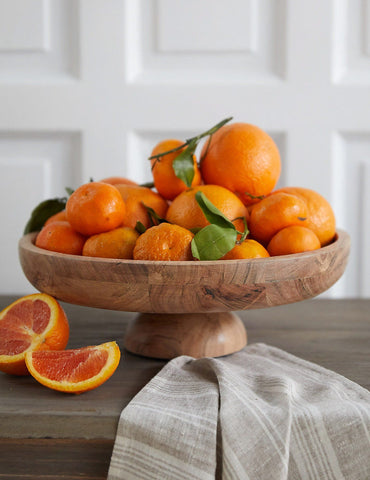 Fruit display in kitchen of clementine’s in a textured wooden fruit bowl with a white board and batten accent wall in the background. Interior design blog about our tips on bringing your kitchen to life without spending too much money. Written by vintage-etc in Cape Town. We make custom made & bespoke tables, benches, free-standing kitchen islands, desks, media units & wardrobes in our Cape Town & Johannesburg workshops – using Oak, Oregon, Ash, Beech, Birch Ply & Meranti. We also sell imported furniture, provide design consulting services & make soft furnishings e.g. sofas & upholstered chairs in linen, velvet & stain resistant fabric.