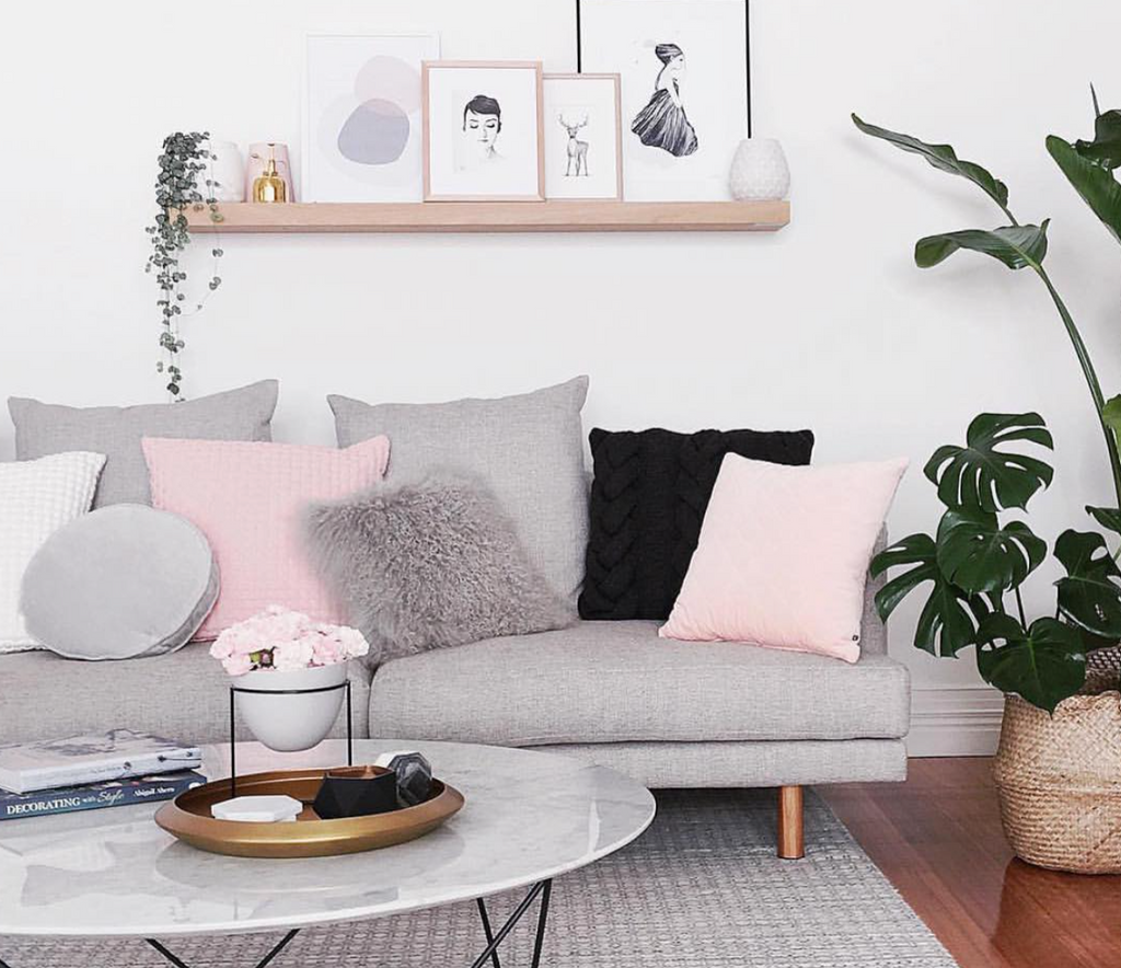 grey, blush & copper trend in living room with chunky knit pillows