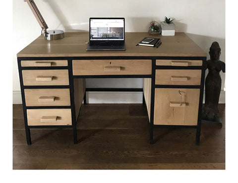 The desk was custom made from Solid Grade A Oak and matte black tubular metal. 