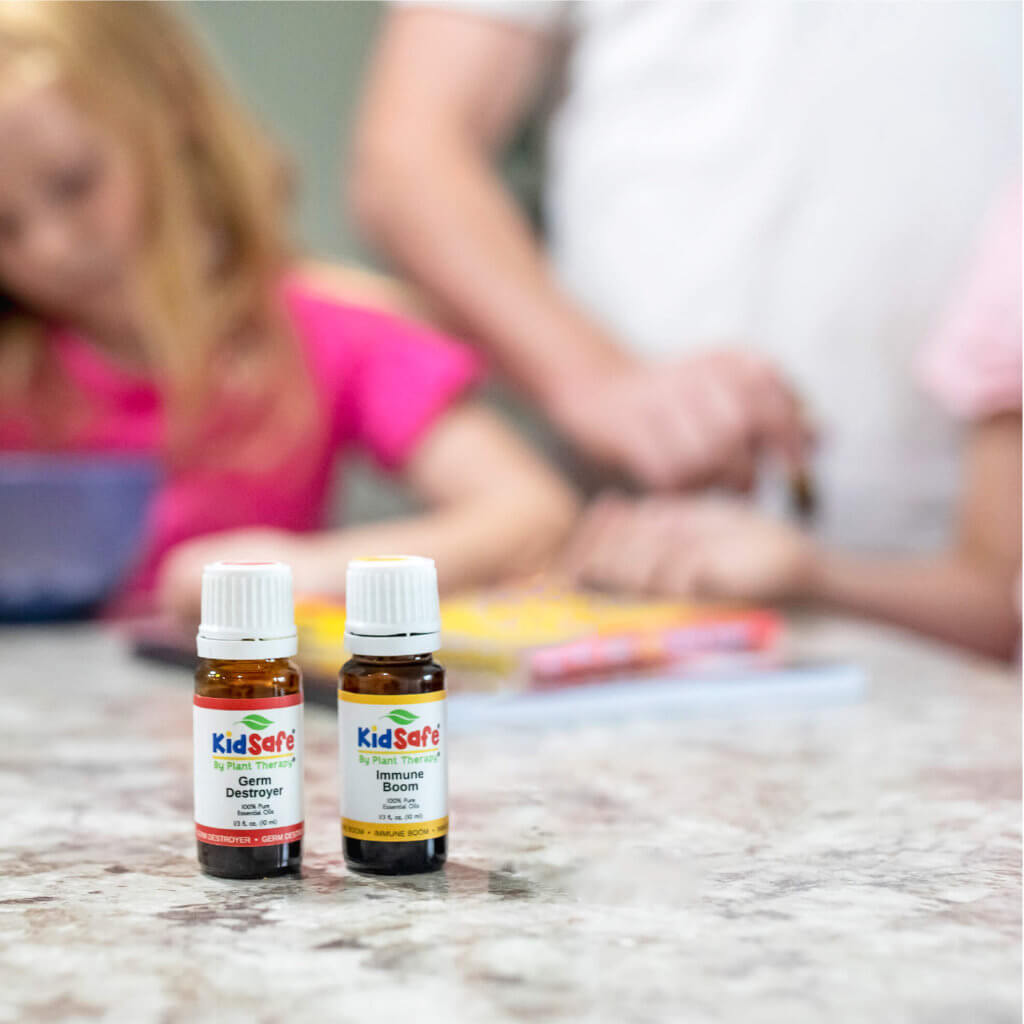 Germ Destroyer and Immune Boom on a kitchen counter