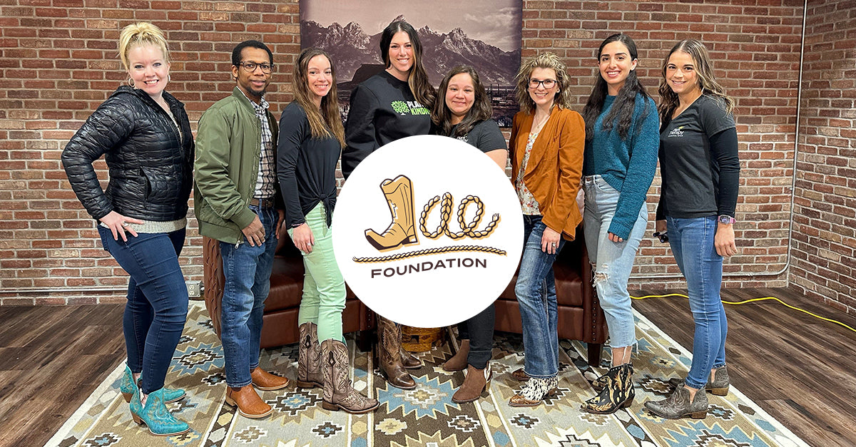 Plant Therapy staff member's visiting the Jae Foundation and wearing their Jae cowboy boots.