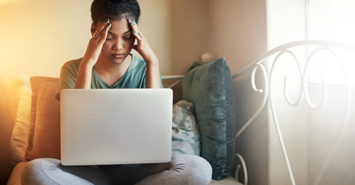 woman stressed out in front of her computer