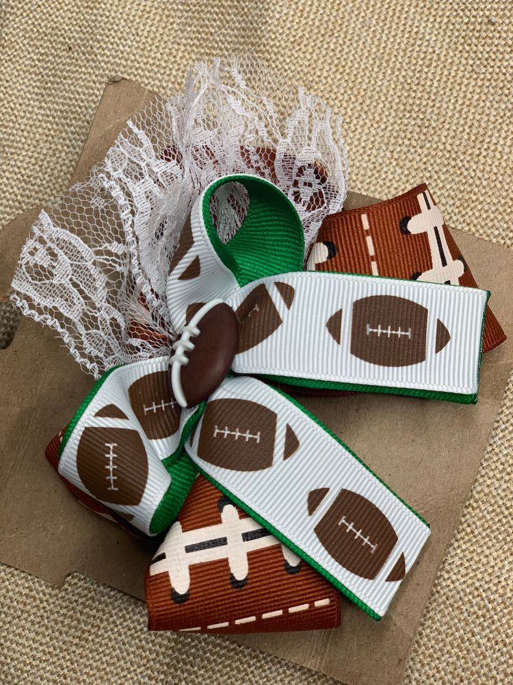 Stacked football bow with clip