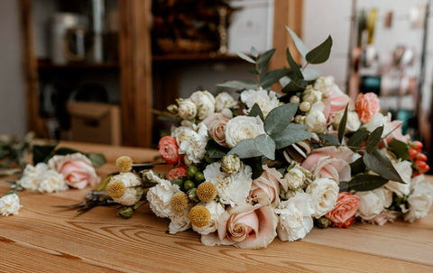 Beautiful Wedding Floral Arrangement On Wooden Table