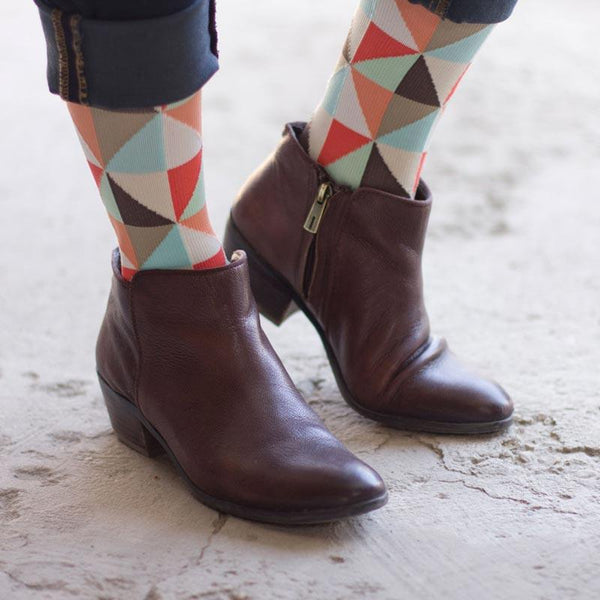 compression socks paired with fashionable boots