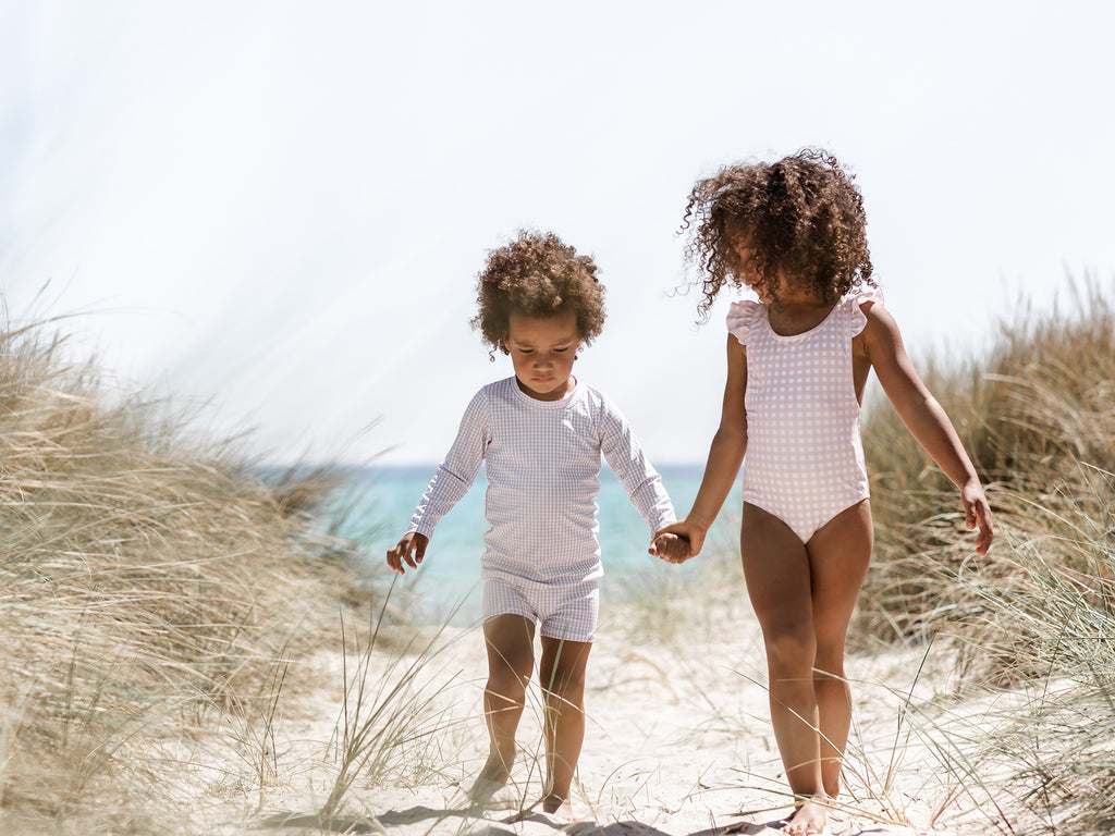 Willow Swim boy and girl at beach kids swimming costumes