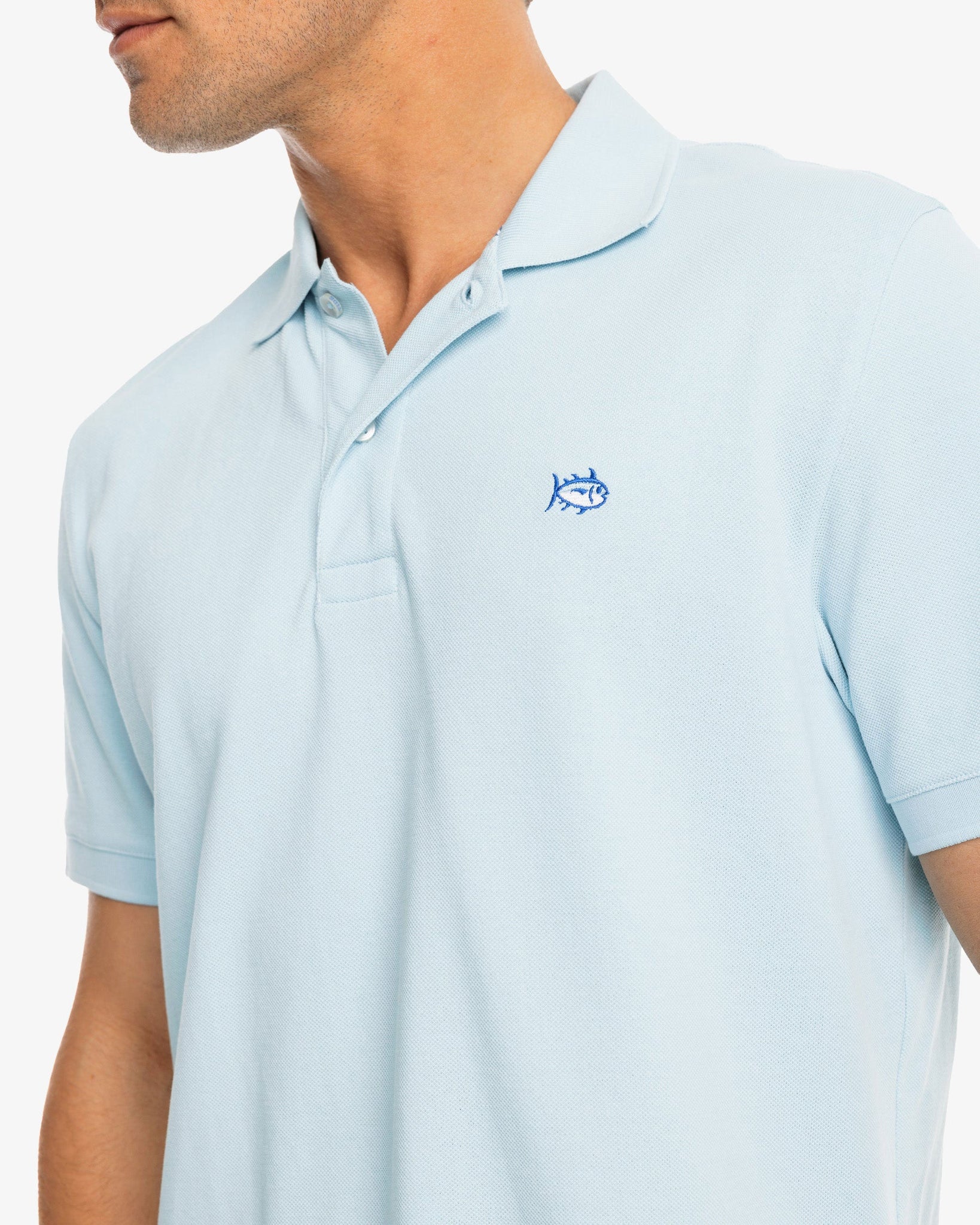 The model detail view of the Men's New Skipjack Polo Shirt by Southern Tide - Aquamarine