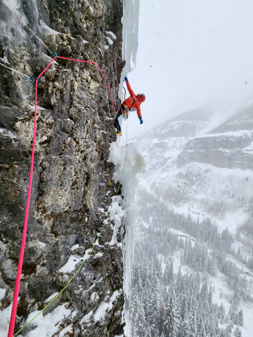 Micah leading traverse on pitch 3 Talisman mixed climbing route Ouray Colorado photo by Frank Robertson