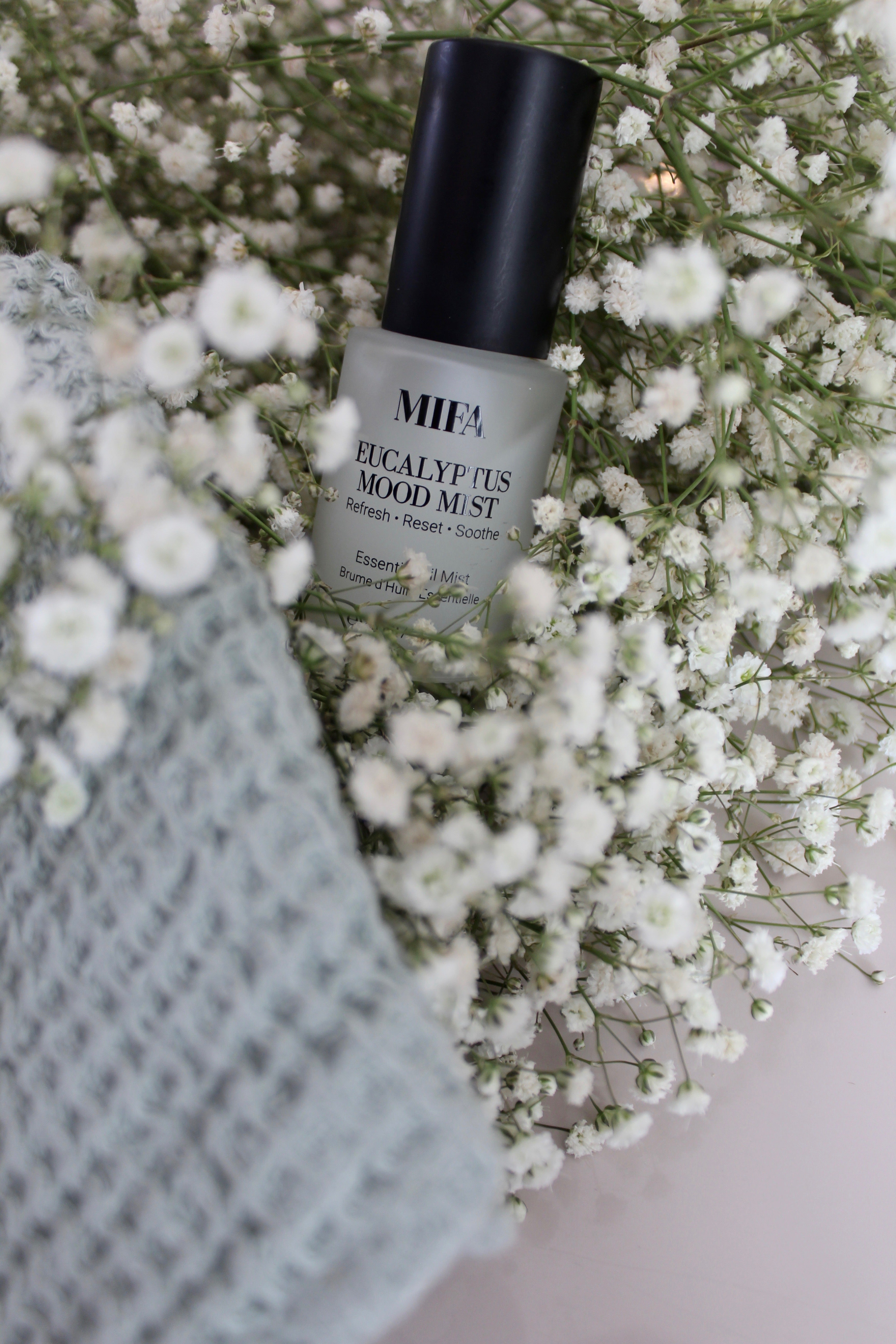 MIFA Eucalyptus Mood Mist Mini in Baby's Breath flowers with the Flax Home waffle linen Bath Sheet in the colour Mint.