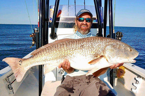 St. Croix Pro Justin Carter with a Big Fall Redfish