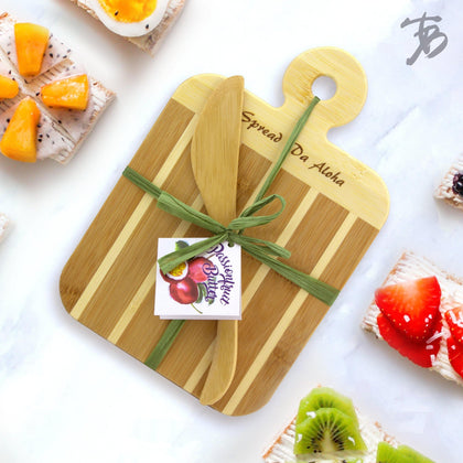 https://cdn.shopify.com/s/files/1/2298/4179/products/spread-da-aloha-serving-and-cutting-board-with-spreader-knife-gift-set-totally-bamboo-333269_420x.jpg?v=1627886723