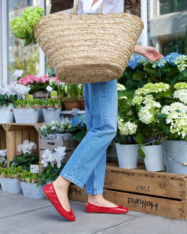 keep things stylish in red ballet pumps