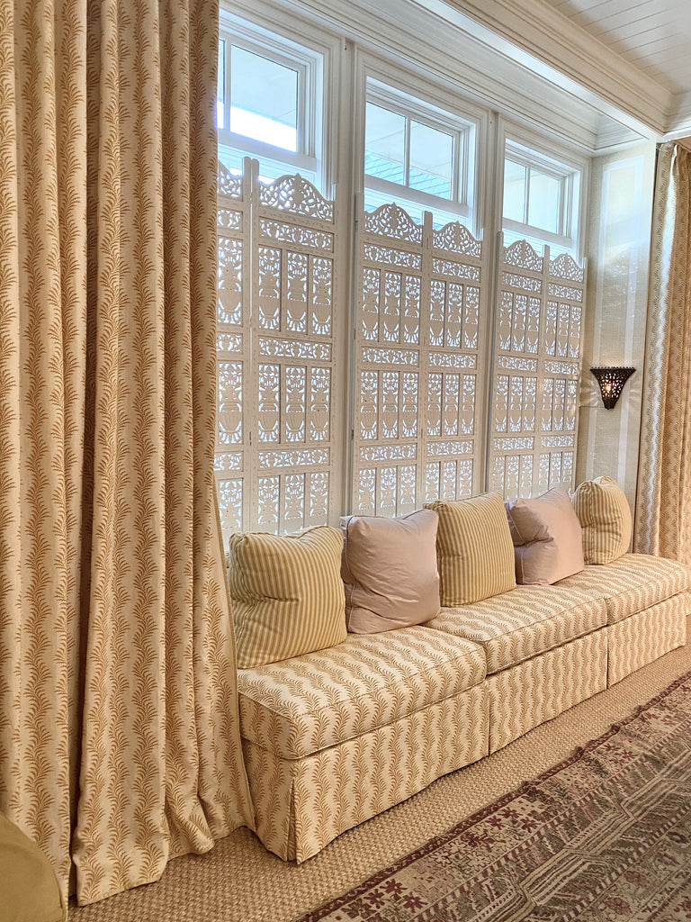 Formal Dining by Cathy Kincaid Interiors  Cathy Kincaid Interiors had me at vintage wool rugs layered on a grand sisal rug!  The detailed trim work was impeccable and she is a master at layering tonal patterns in a fresh way!